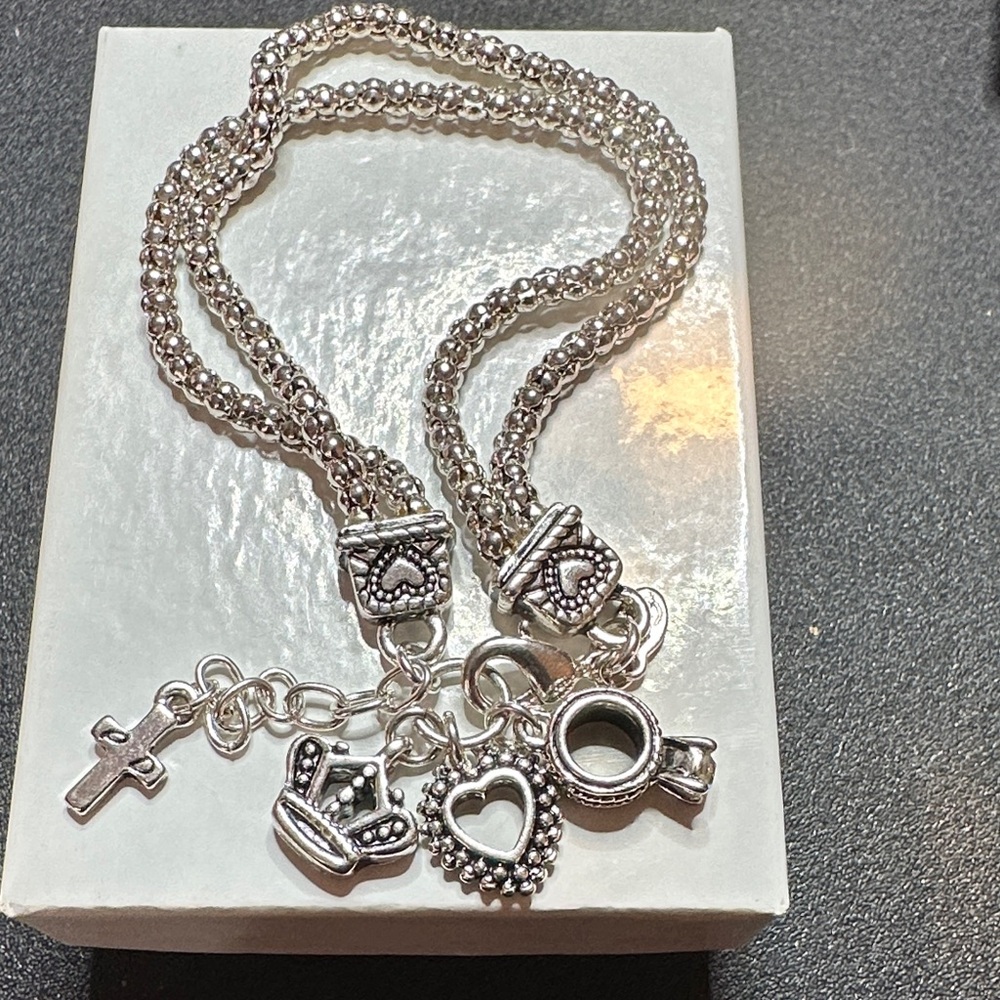 Brighton Silver Charm bracelet with Heart and Crown Pendants
